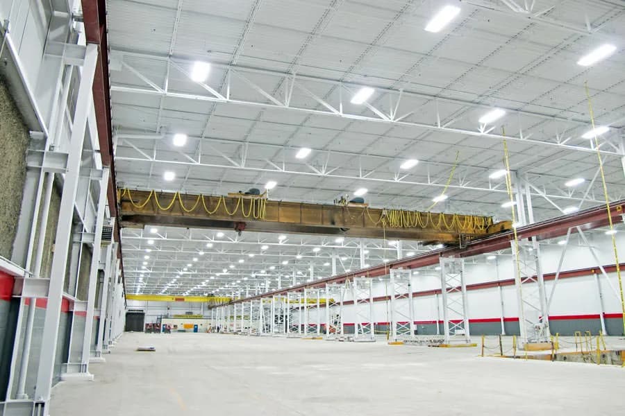 Empty big box retail space after being painted with a paint sprayer