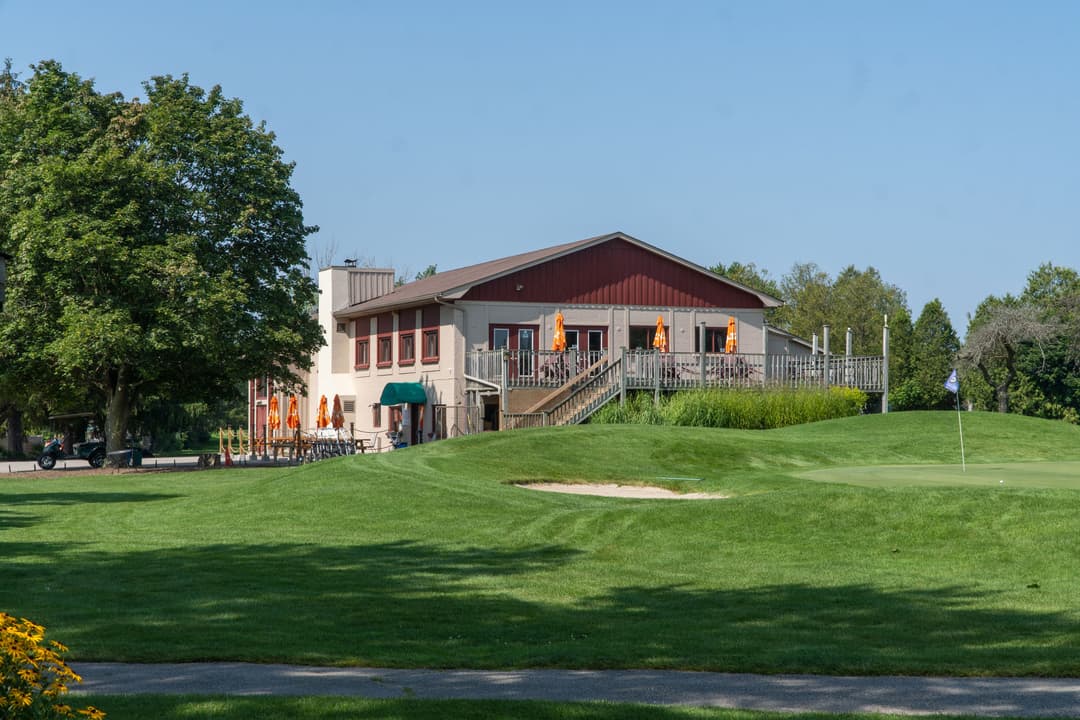 Brightly painted clubhouse exterior at Maple Ridge Golf Club.